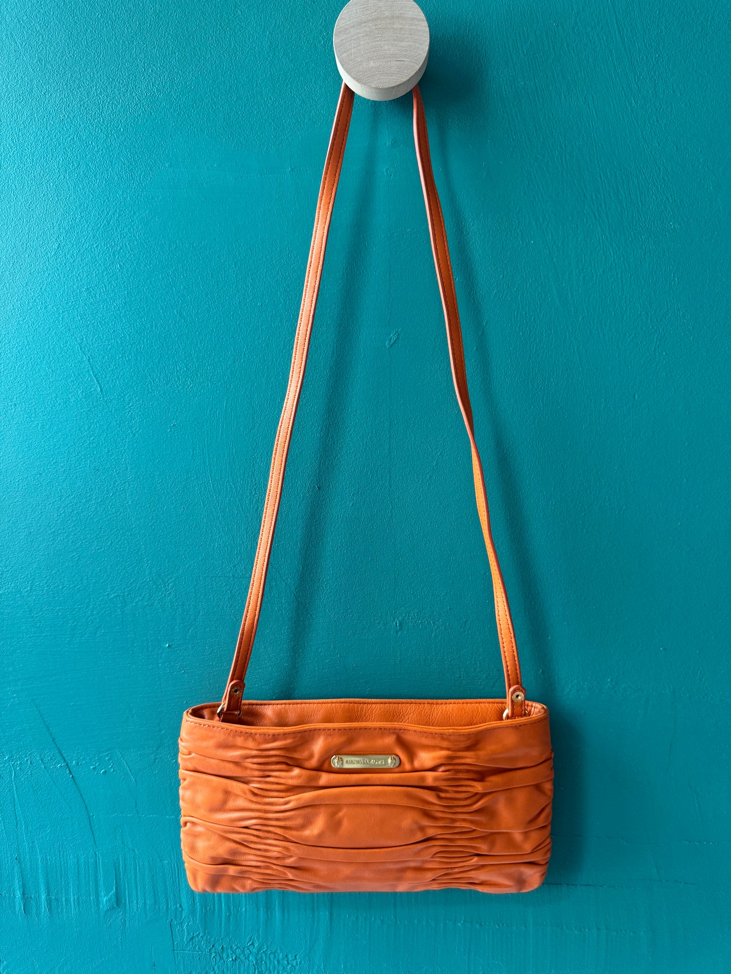 Michael Kors orange väska