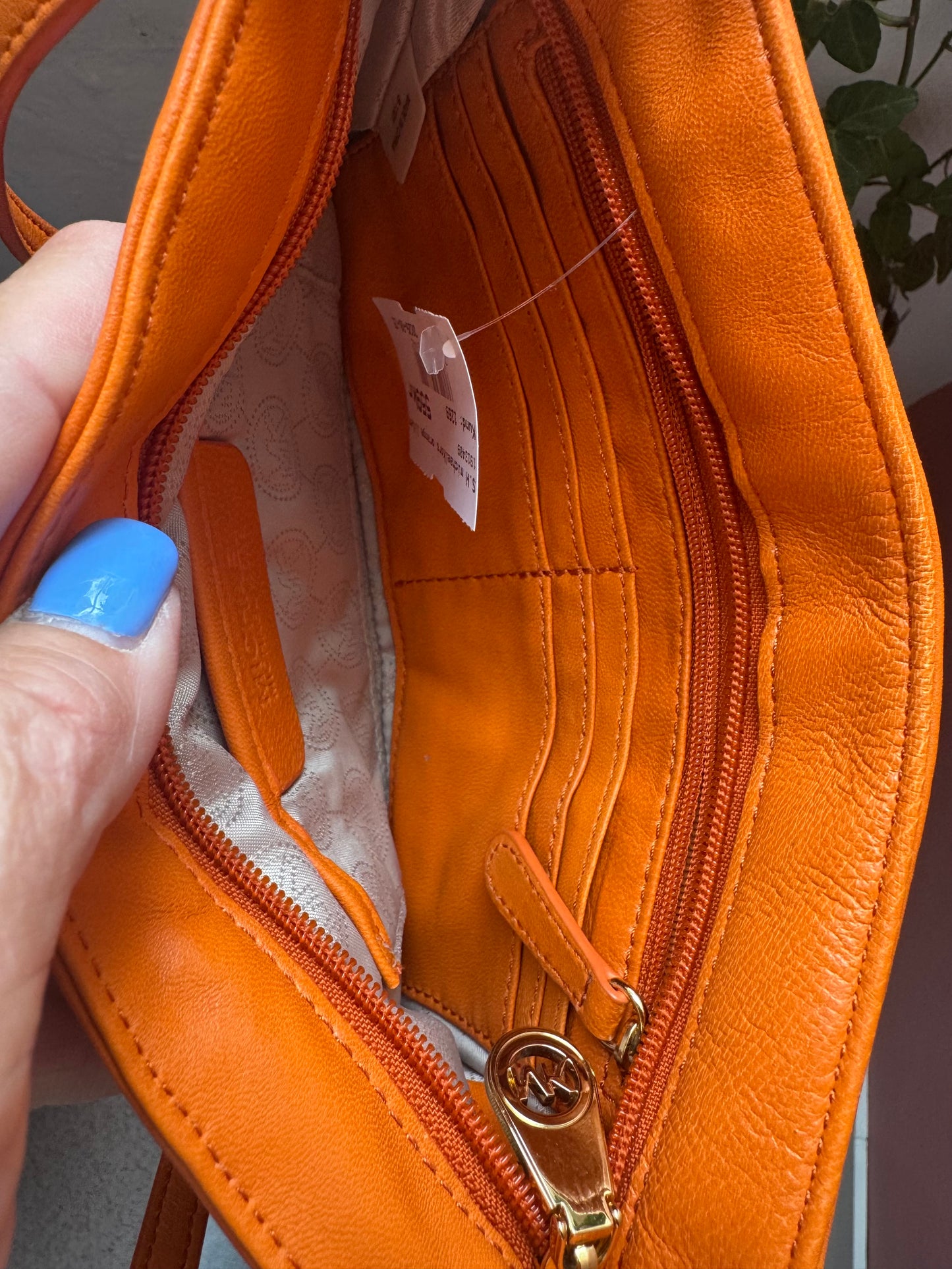 Michael Kors orange väska