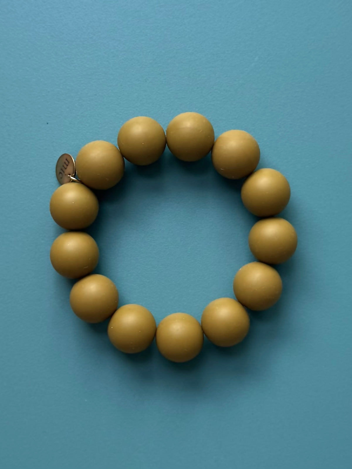 Armband MELLAN Olivgrön
